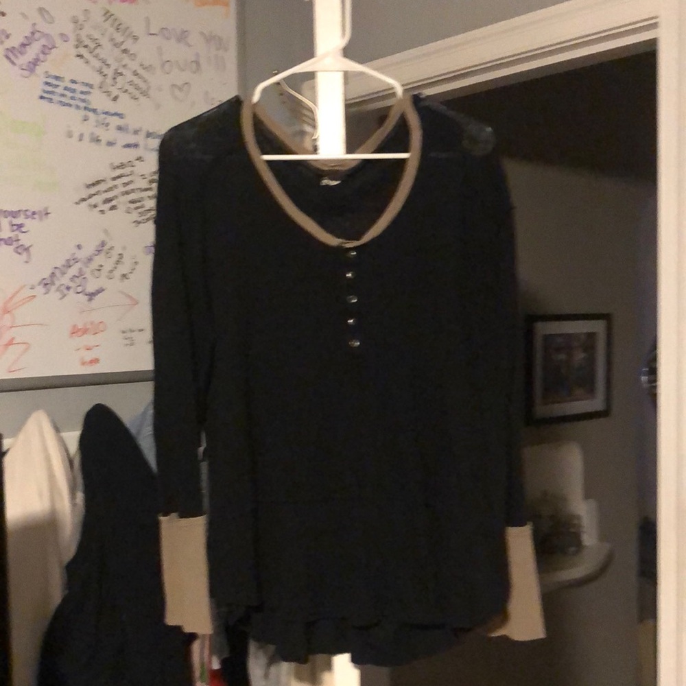 Free people black with khaki outline around the collar and sleeves.